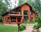 Проект двухэтажного деревянного дома из бревна